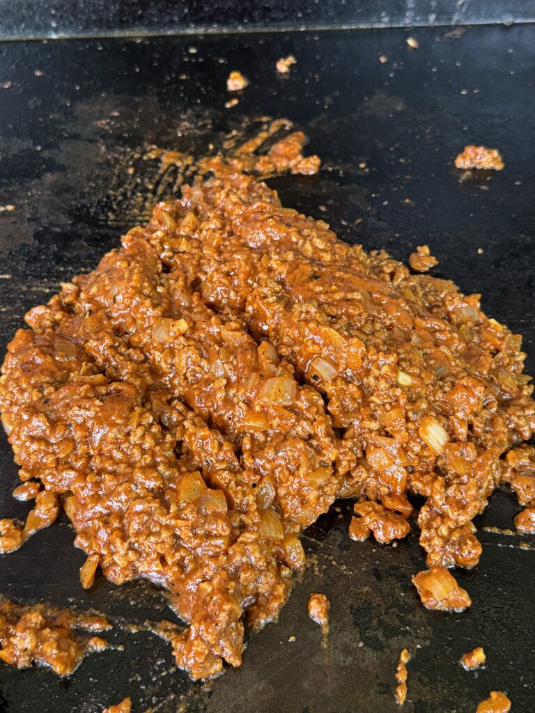 seasoned mixture of the meat and onions