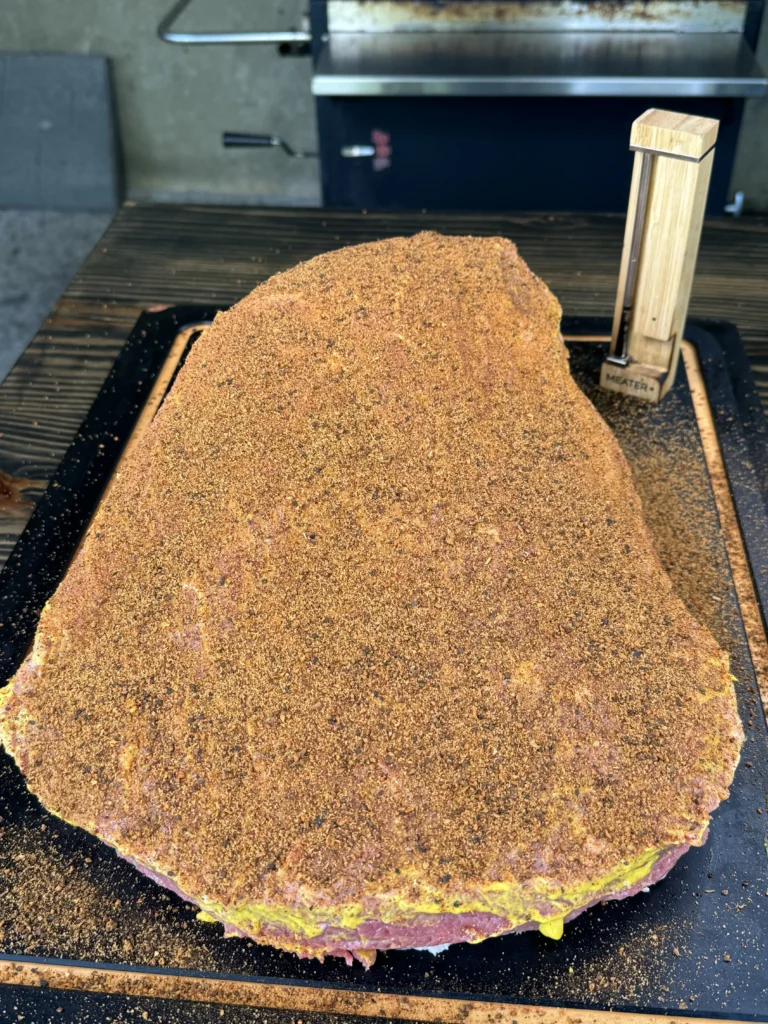 trimmed brisket on a cutting board