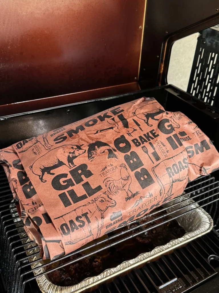 wrapping the brisket in the smoker