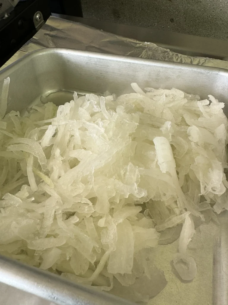 sliced up white onions 