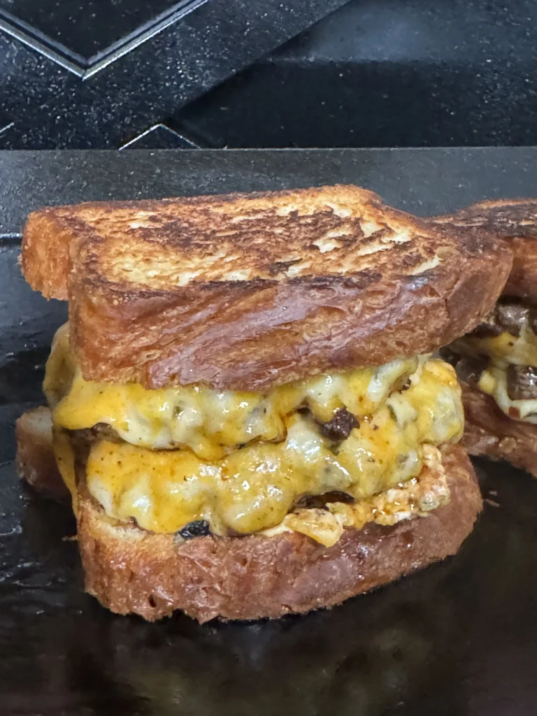 smash burger on the grill