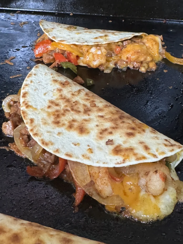cooking the Andouille and shrimp tacos