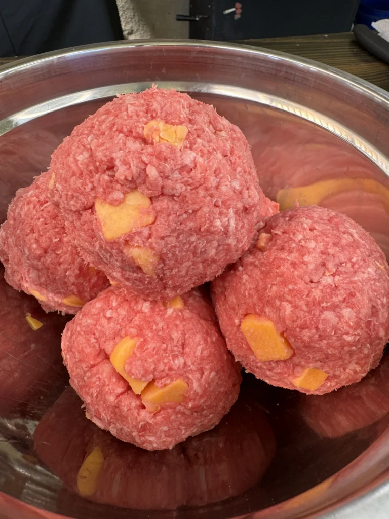 ground beef with cheese in the middle
