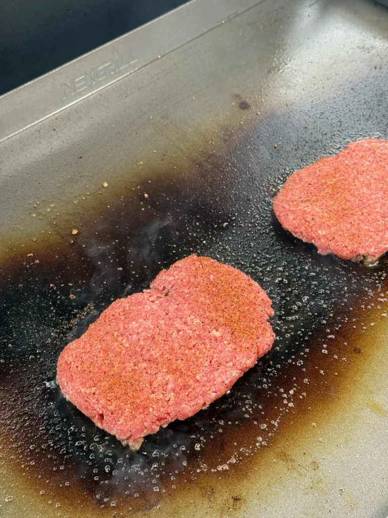 grilled patty on the griddle