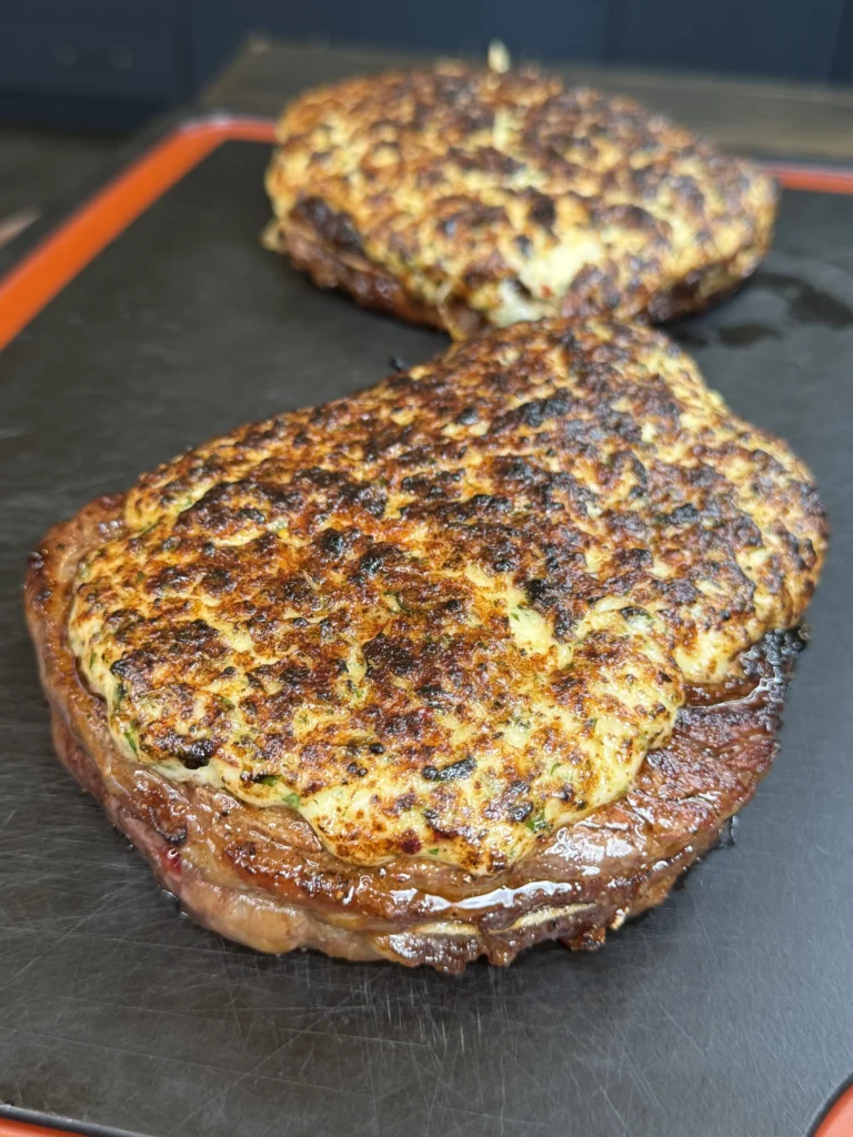 cheese crusted grilled steaks