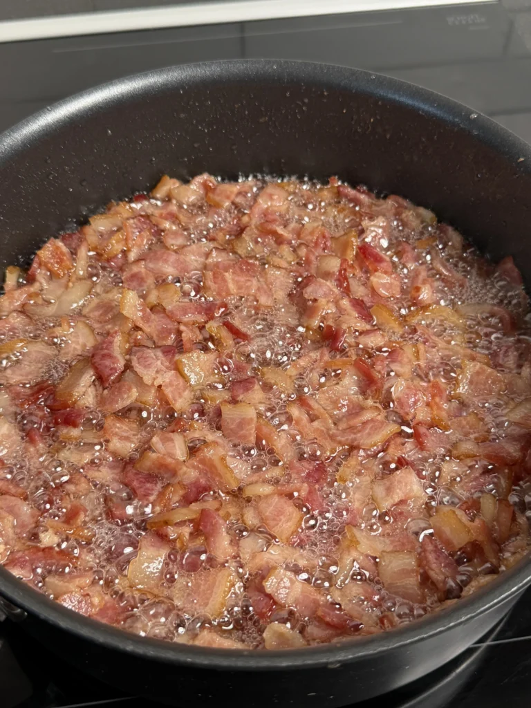 bacon cooking in a pan