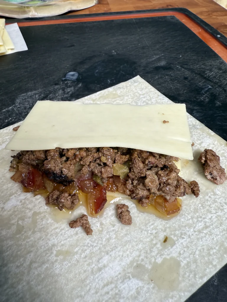 rolling the egg rolls for frying