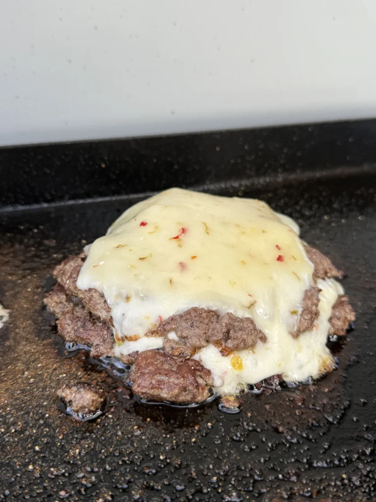 stacked patties on the grill