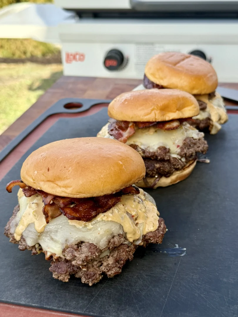 Bacon Jalapeño Smash Burger with melted cheese on a toasted brioche bun