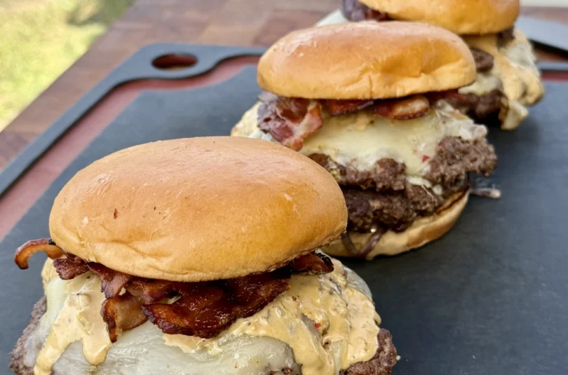 Bacon Jalapeño Smash Burger with melted cheese on a toasted brioche bun