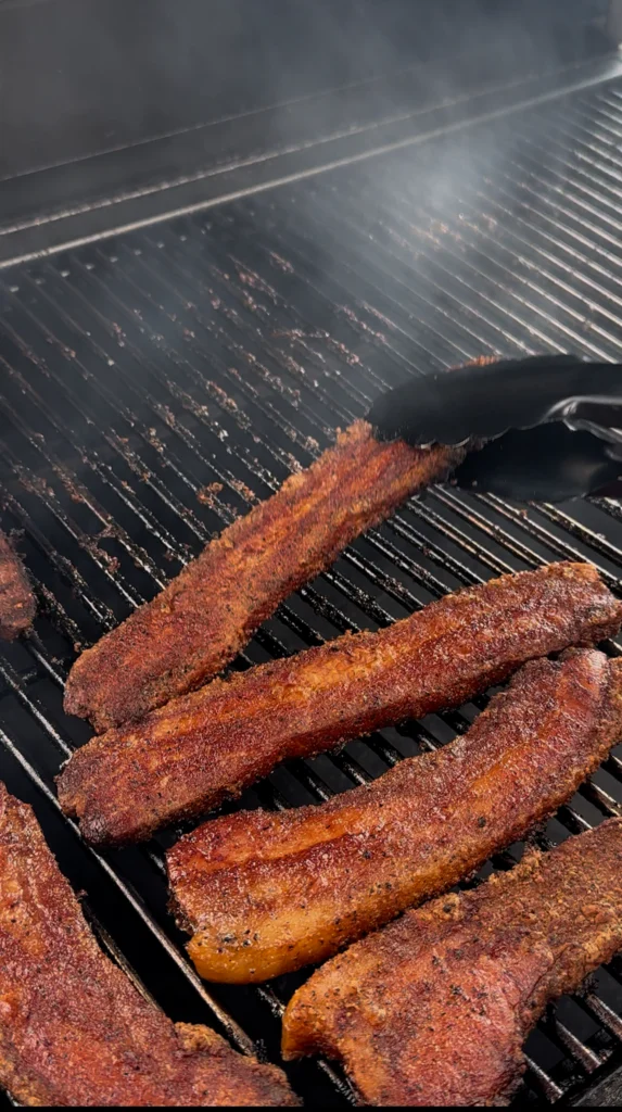 Smoked pork belly pieces ready to be fried into crispy chicharrón
