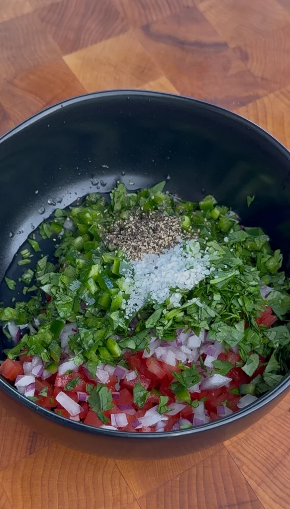 Chopped tomatoes, onions, and jalapeños ready to make pico de gallo