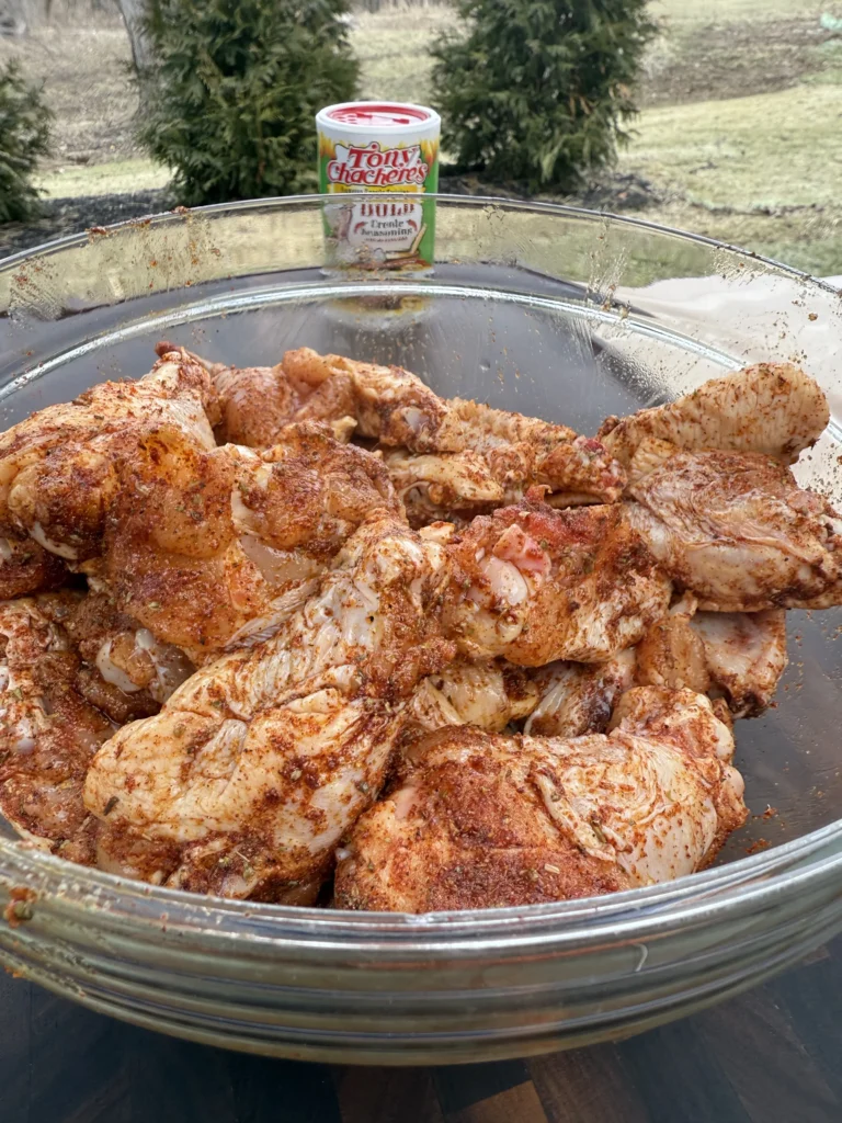 perfectly coated chicken wings in a bowl
