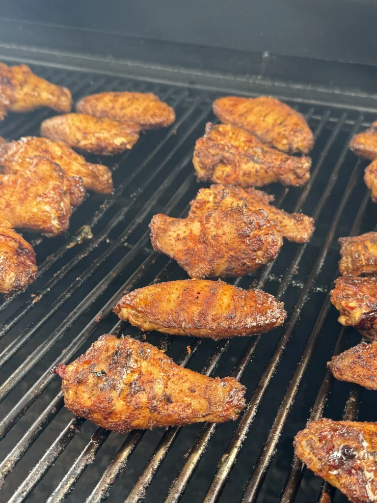 grilled smoked wings on a the grill grates