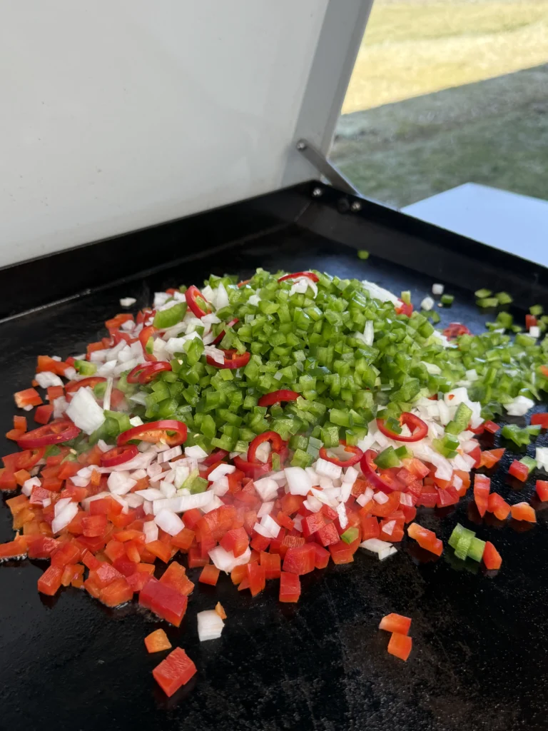 veggies cooking on the grill for quesadilla