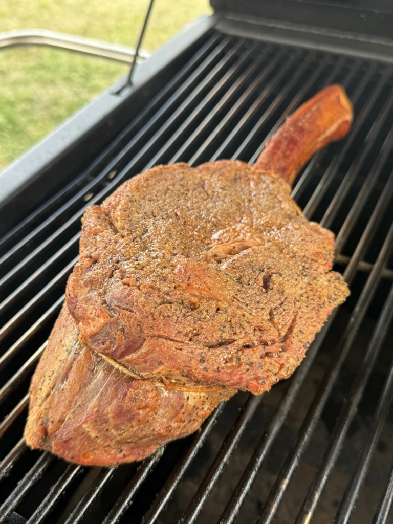 reverse seared smoked steak on a grill