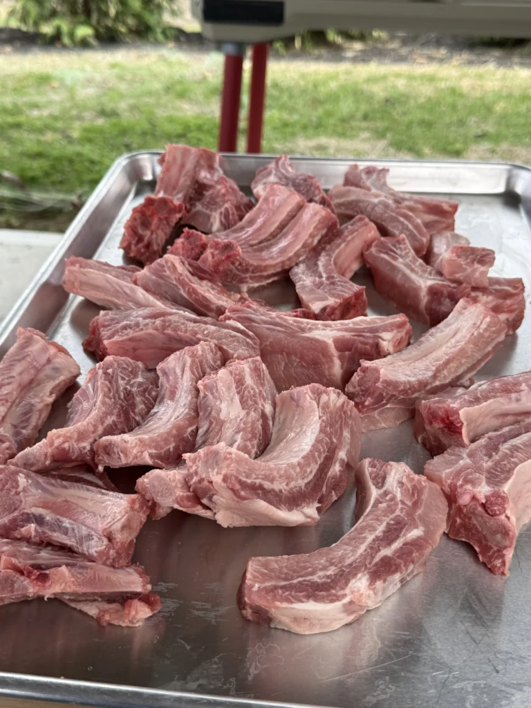 prepped ribs on a metal pan