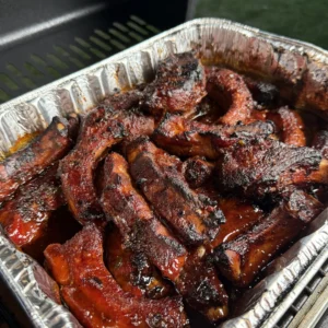 glazed party ribs in the metal pan