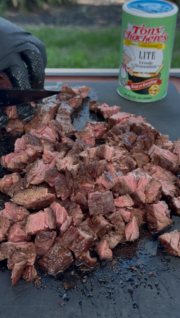 cut up skirt steak on a cutting board
