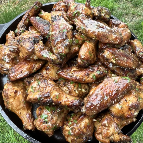 Plate of smoked garlic lemon pepper wings ready to eat