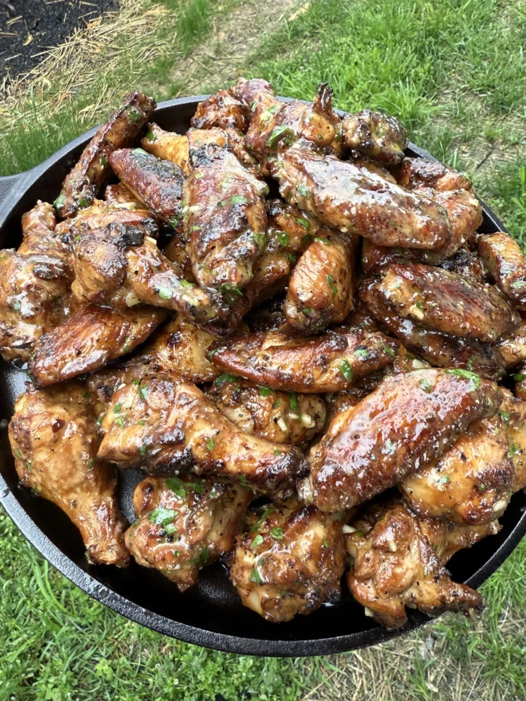 Plate of smoked garlic lemon pepper wings ready to eat