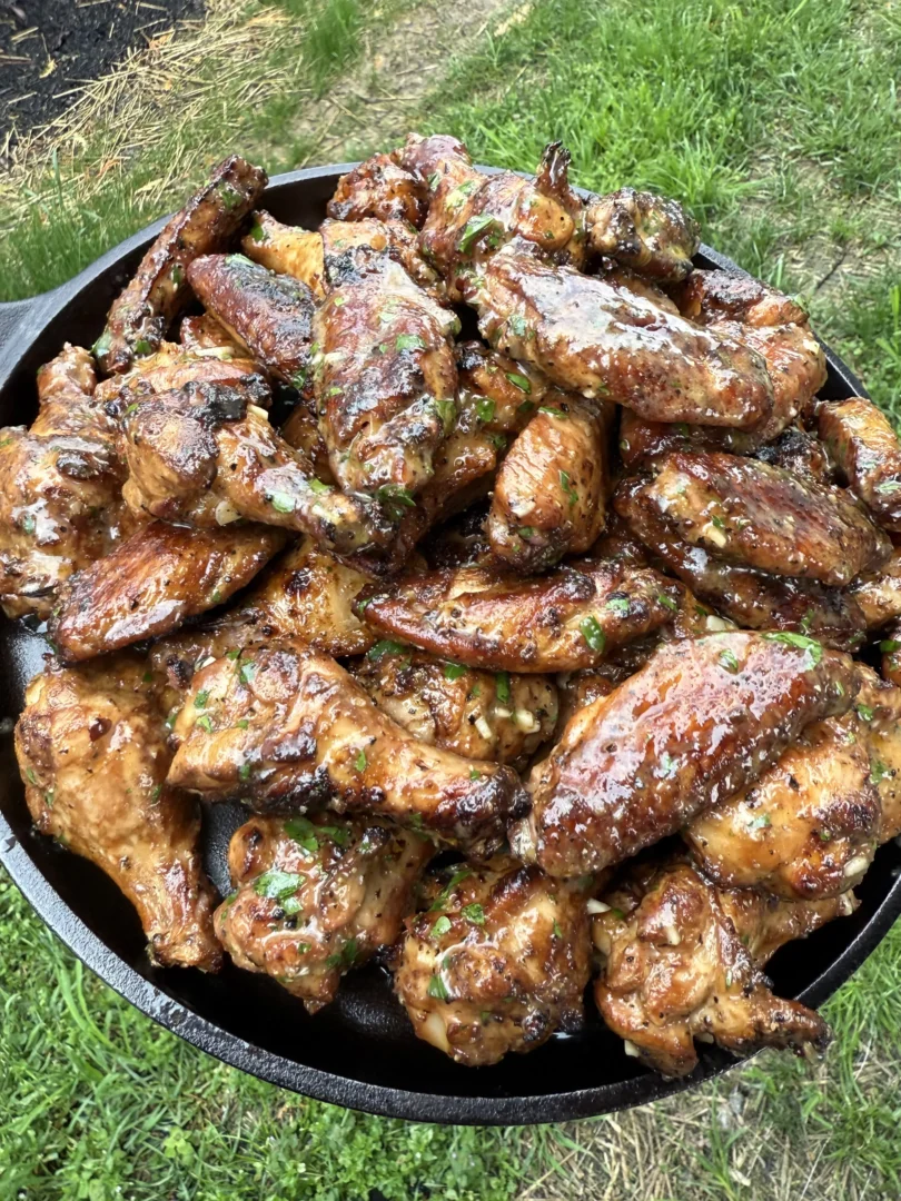 Plate of smoked garlic lemon pepper wings ready to eat