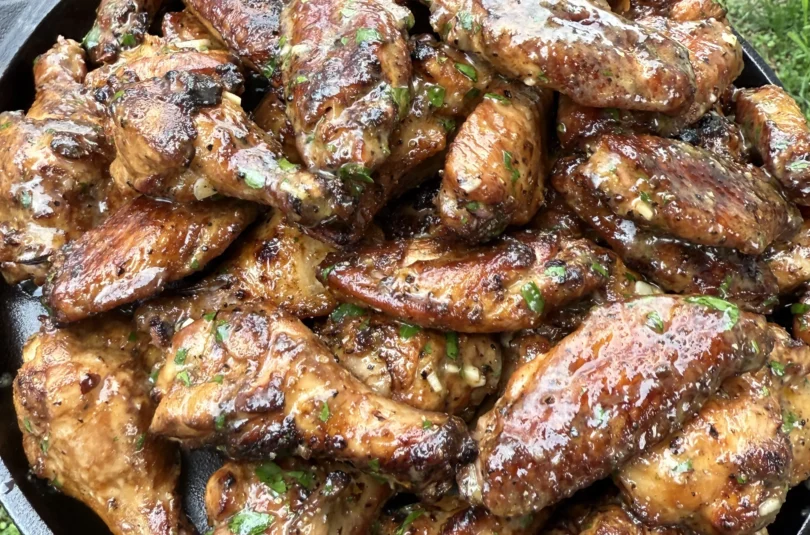 Plate of smoked garlic lemon pepper wings ready to eat