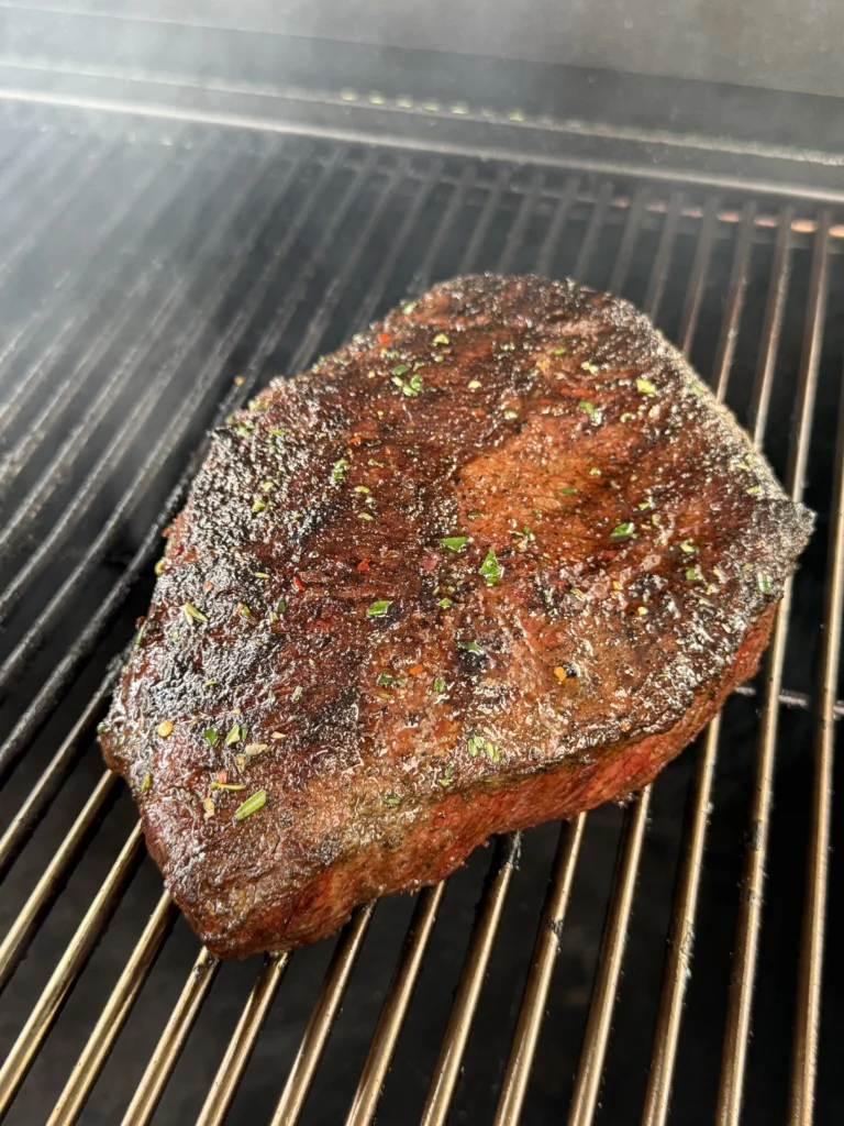 Grilling Picanha fat-side up over indirect heat