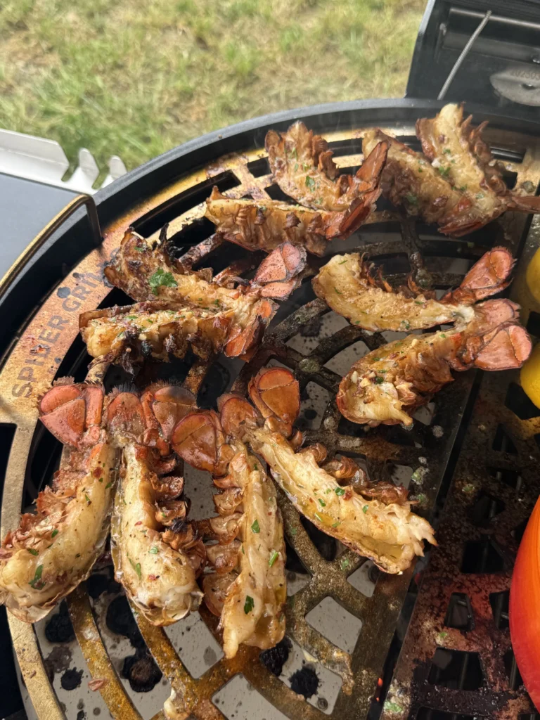 basting lobsters on the grill
