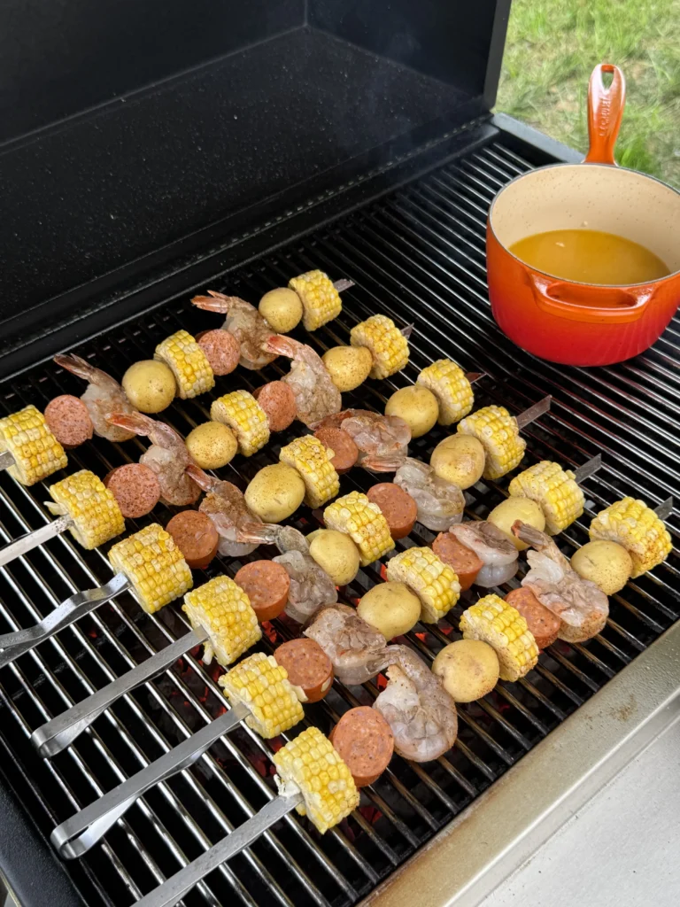 seafood boil skewers on a grill
