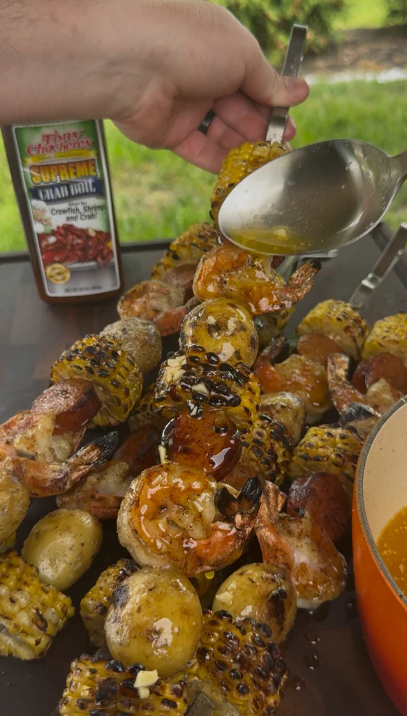 covering seafood boil in garlic butter