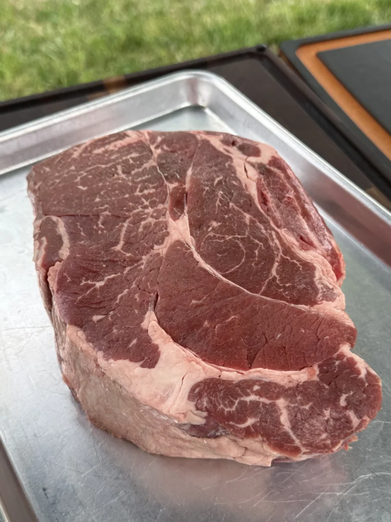 chuck roast on a pan to be prepped