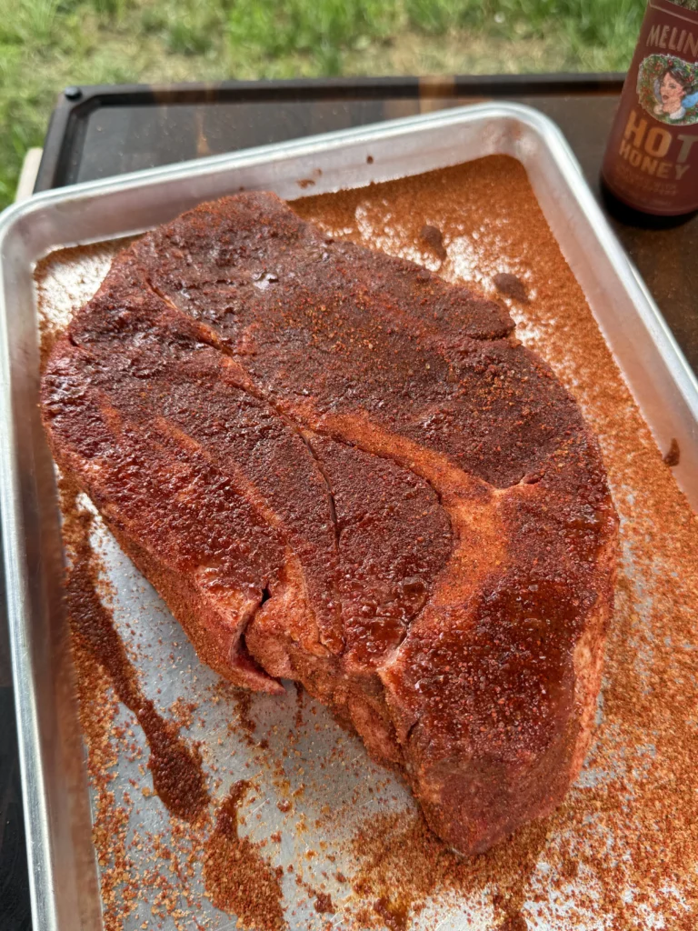 seasoned meat in a pan
