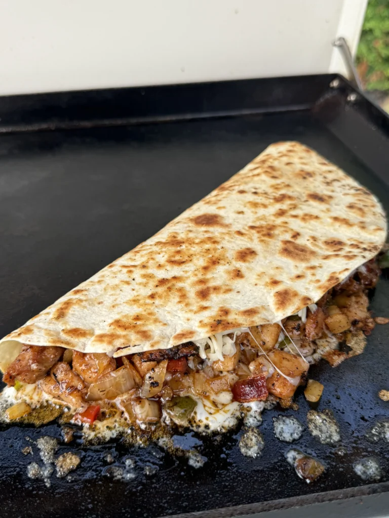 half grilled quesadilla on a grill