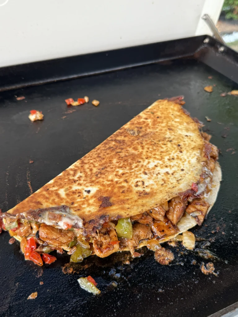 perfect brown quesadilla on a griddle