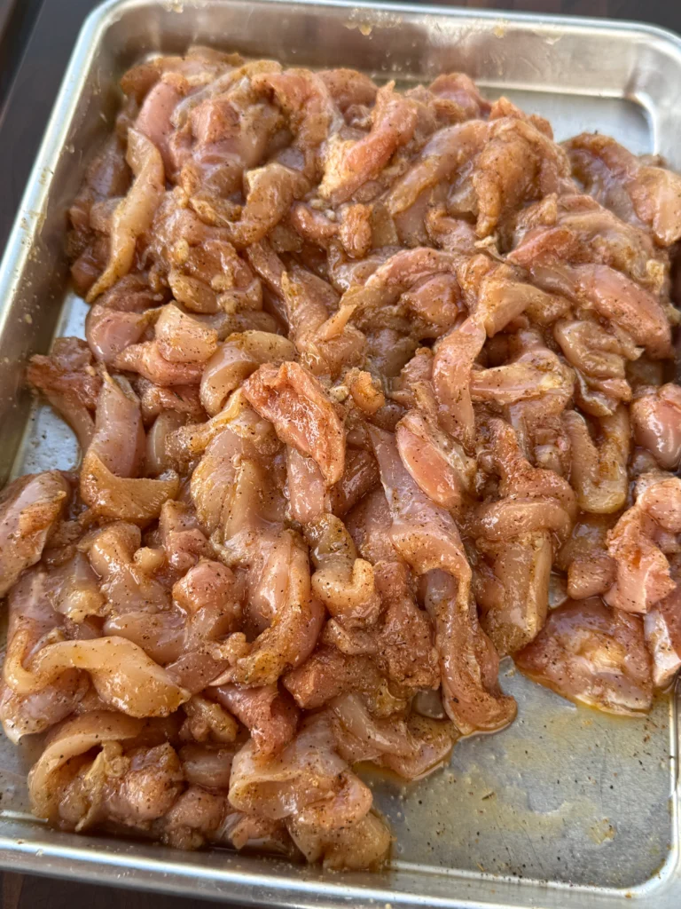 marinaded chicken on a pan