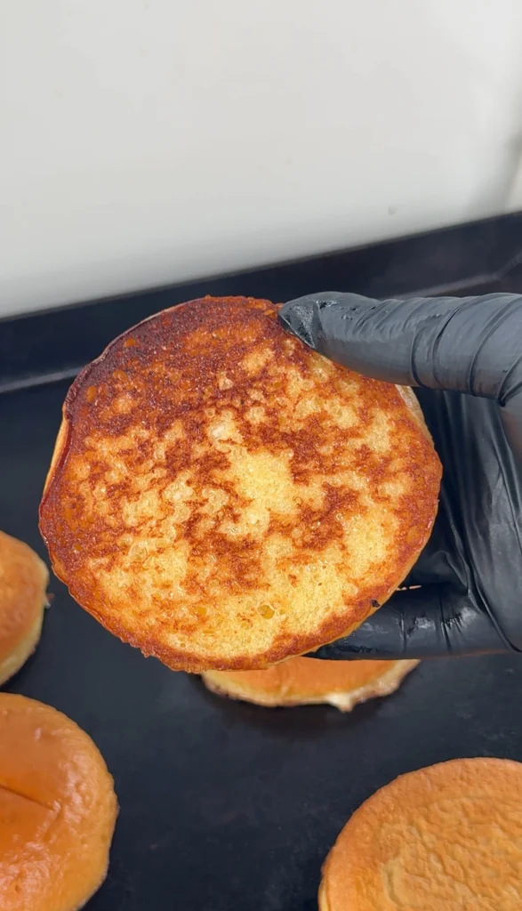 perfectly toasted buns on the griddle