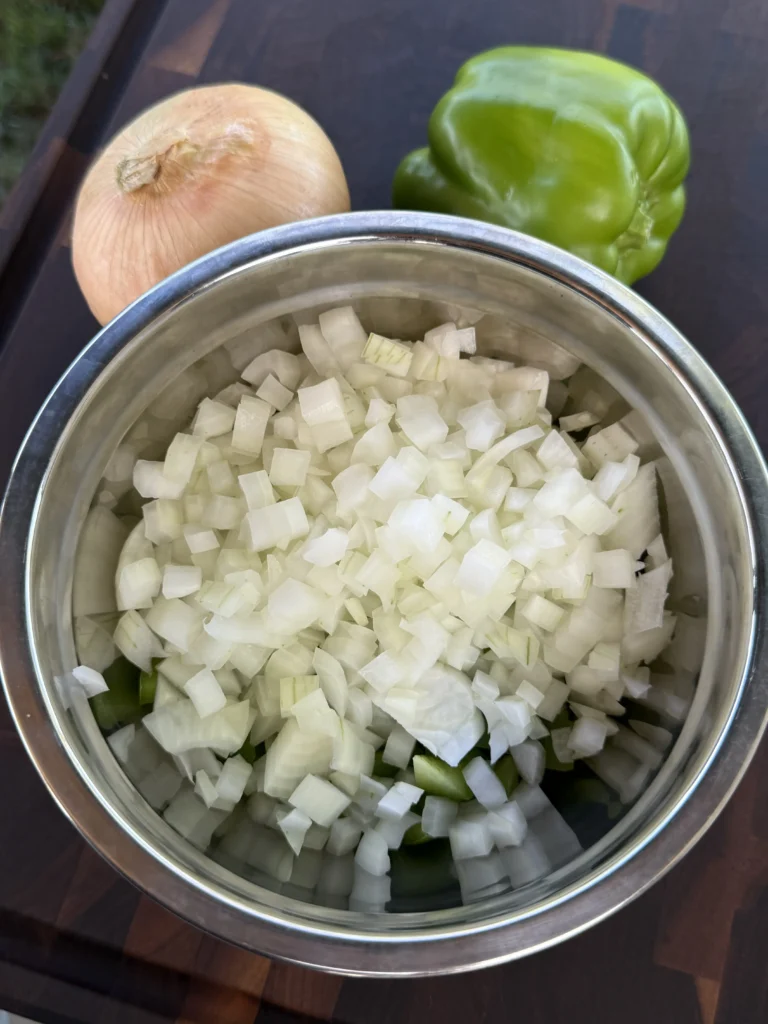onions for the crunchwraps in a bowl