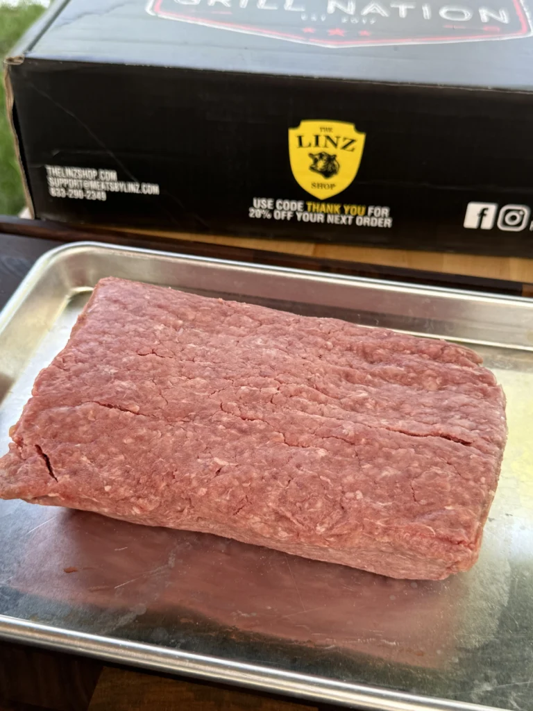 ground beef block on a tray