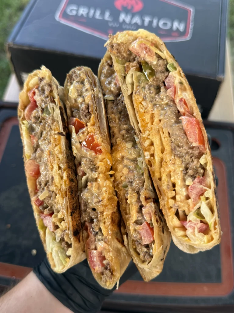 2 tiktok chopped cheese Crunchwraps being held