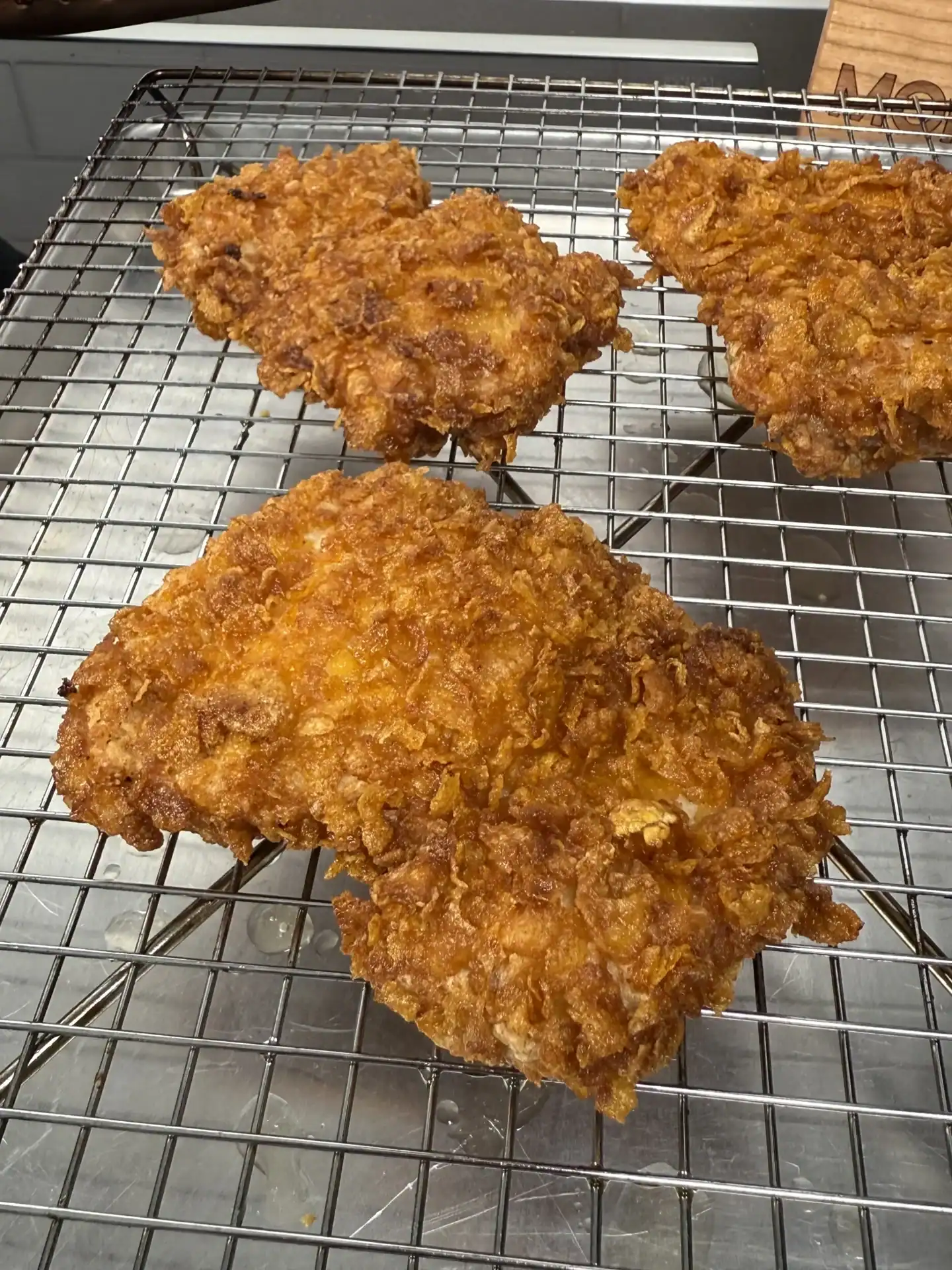 double frying the chicken for the spicy chicken sandwiches