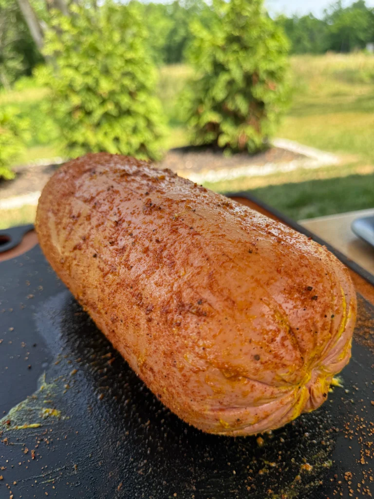seasoned meat on a pan