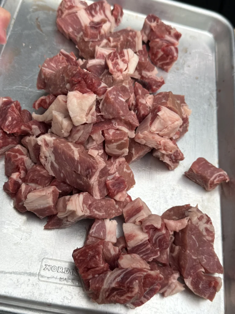 sliced ribeye on a metal tray