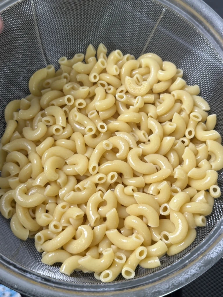 al dente pasta in the a strainer