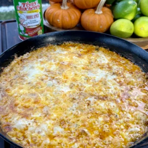 buffalo chicken dip in a cast iron