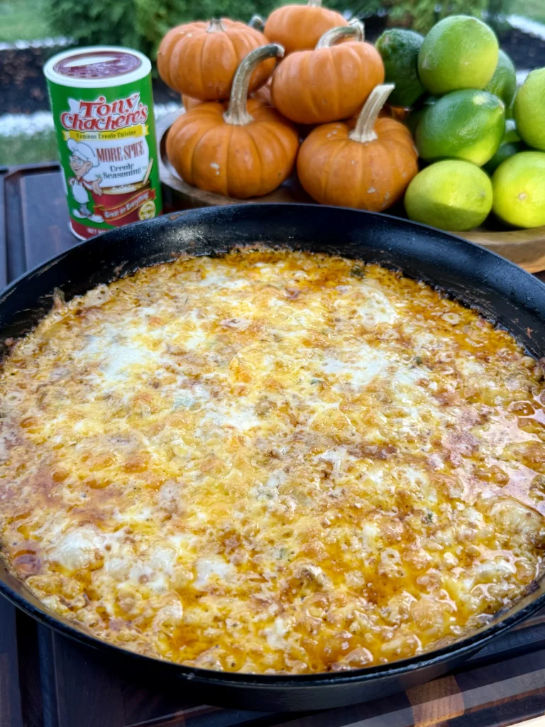 perfect buffalo chicken dip in a cast iron skillet