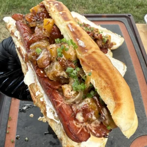 up close of pineapple bacon jam hot dogs