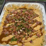 chicken bacon ranch queso in a pan