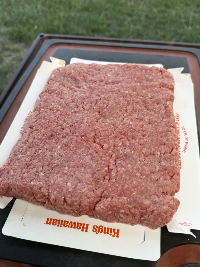 slab of ground beef on a pan