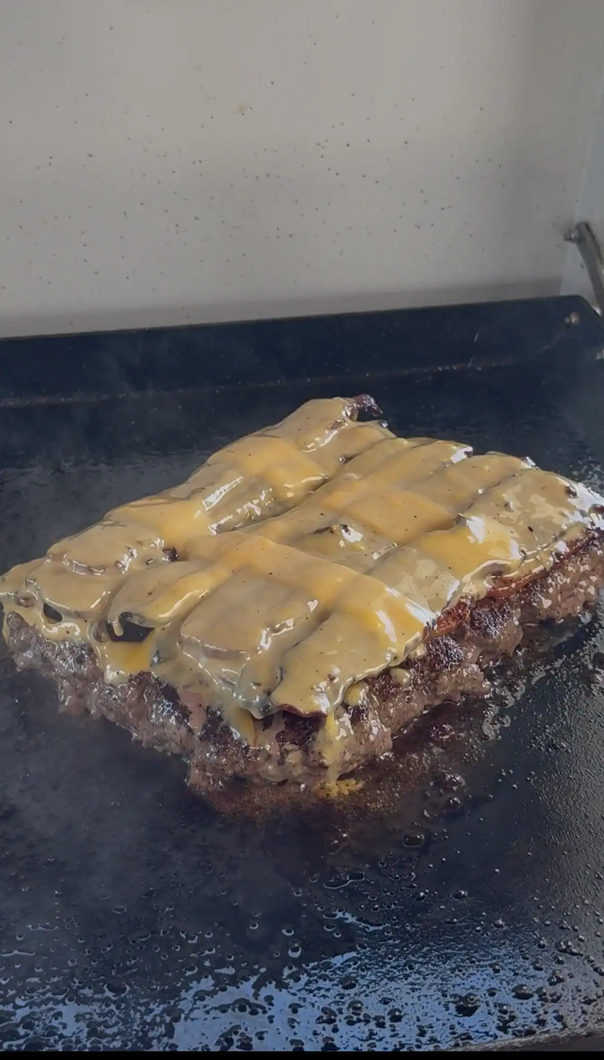 melted cheese on the ground beef